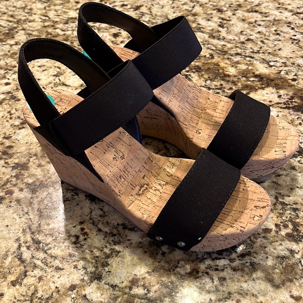 New with tags Lucky Brand 4” tall wedge heels, black straps. Never worn, size 8.